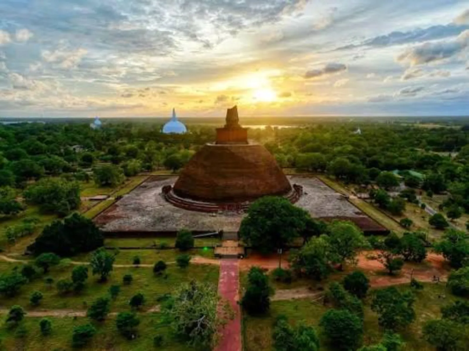 The white dagoba of Ruwanwelisaya rising above the ancient city of Anuradhapura