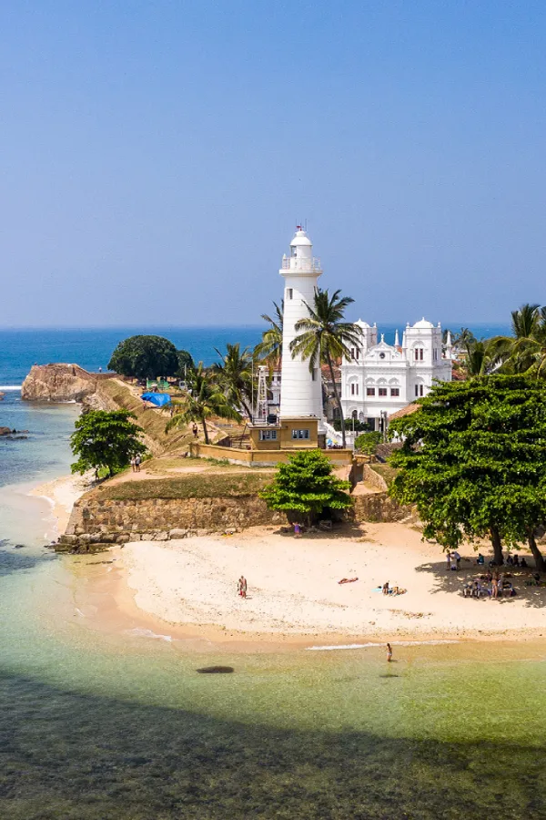 The historic ramparts and lighthouse of Galle Fort overlooking the Indian Ocean